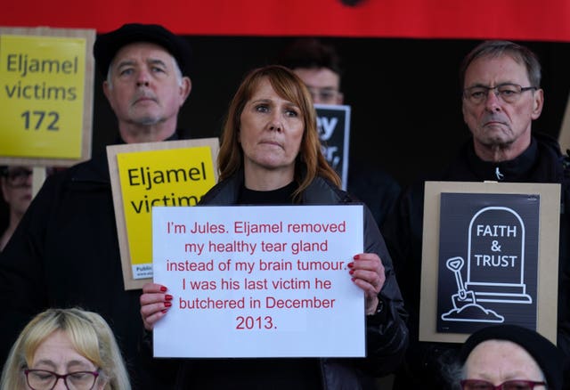 Campaigners holding placards calling for the Eljamel Inquiry