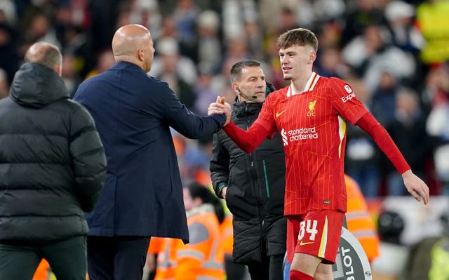 Liverpool’s Conor Bradley (right) is congratulated by manager Arne Slot