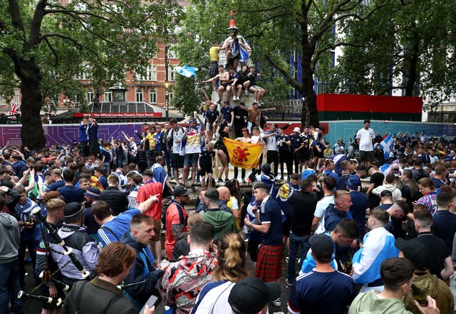 Football fans gathered in large numbers in Leicester Square before the UEFA Euro 2020 match between England and Scotland