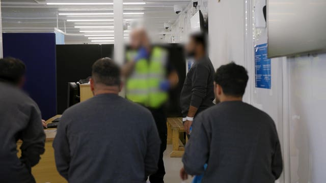 People wait at Manston