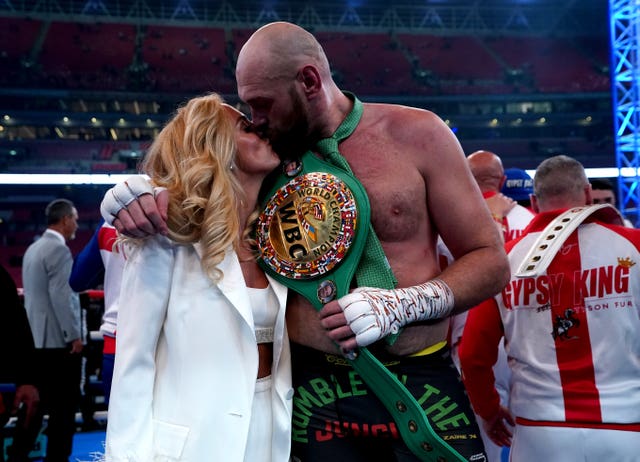 Tyson Fury celebrates his victory with wife Paris 
