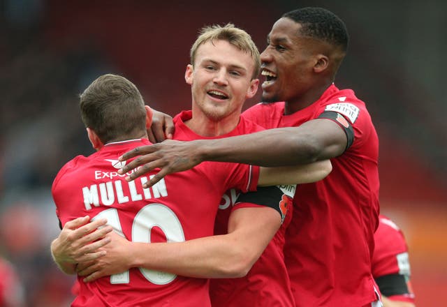 Wrexham celebrate scoring in their victory over Oldham