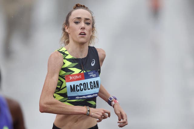 Eilish McColgan crosses the line