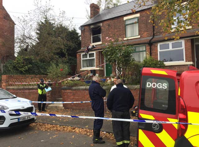 Police and firefighters at the scene in Ilkeston