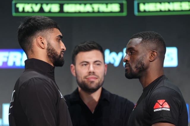 A staredown between Adam Azim and Ohara Davies