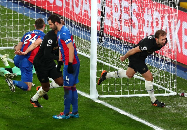Craig Dawson celebrates scoring West Ham's third goal