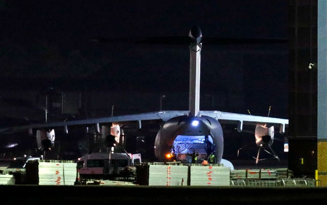 An RAF Atlas, believed to be carrying a cargo of PPE, is unloaded at Brize Norton (Steve Parsons/PA)