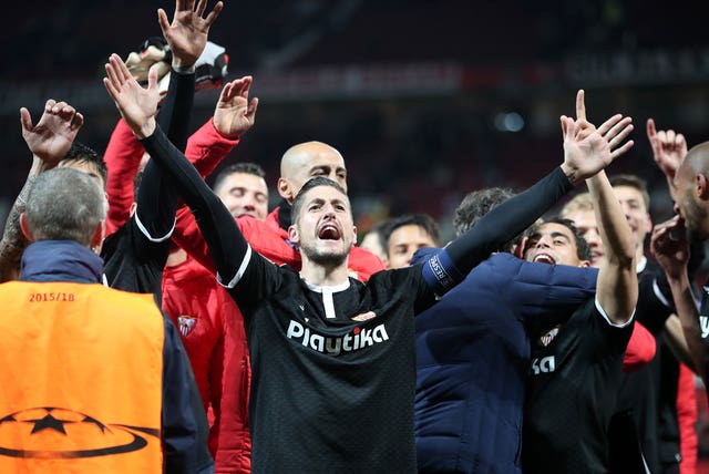 Sevilla’s Sergio Escudero celebrates at Old Trafford