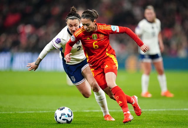 Spain midfielder Aitana Bonmati, right, in action against England in February