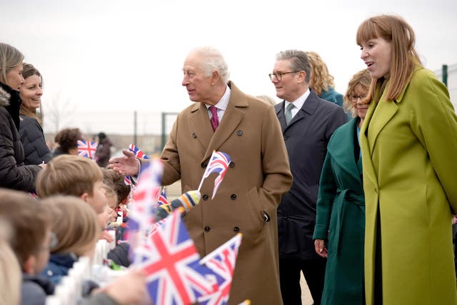 The King, accompanied by Prime Minister Sir Keir Starmer and Deputy Prime Minister Angela Rayner, meet schoolchildren during a visit to Nansledan School in Newquay, Cornwall