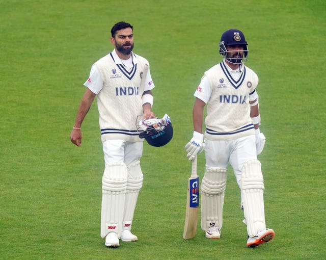 Virat Kohli (left) and Ajinkya Rahane helped India to 146 for three at the close of day two 