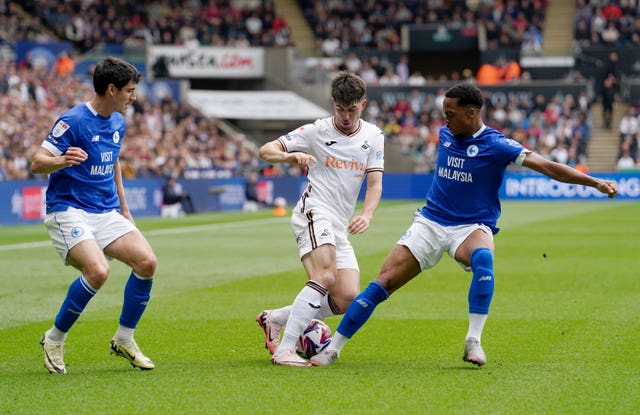 Josh Key battling for the ball with Callum O’Dowda and Chris Willock