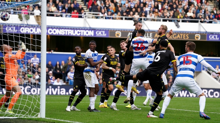 Leon Balogun (fourth right) hit the QPR winner (PA)