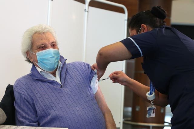 Lionel Blair receiving a coronavirus vaccine