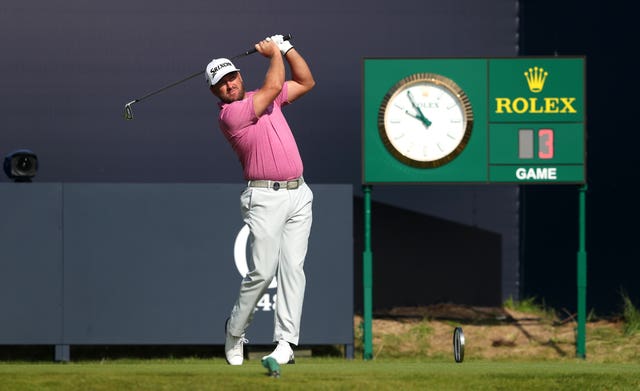 Graeme McDowell tees off at the first hole on day three of the Open at Royal Portrush.