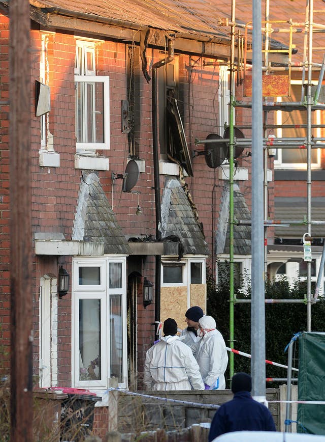 Forensic officers at the scene of the fire on Jackson Street in Worsley (Peter Byrne/PA)