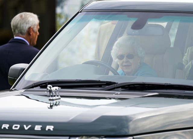 The Queen in an electric hybrid Range Rover