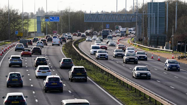 Motorists on Christmas Eve travel on the M42 south of Birmingham 