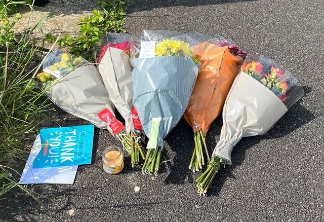 Flowers left at the scene in Huddersfield