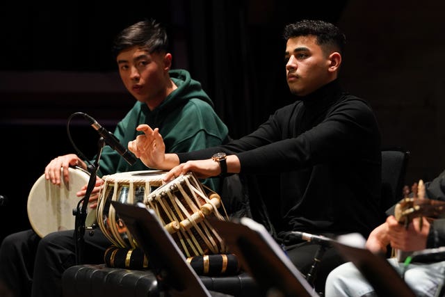 Afghan Youth Orchestra practice their show