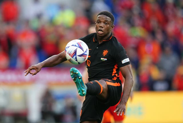 Tyrell Malacia in action for the Netherlands