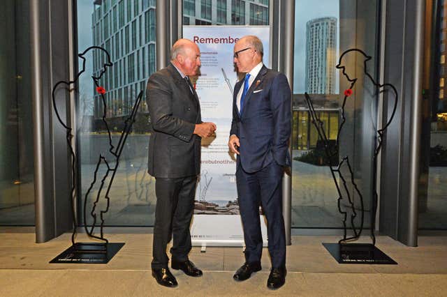 US Ambassador to the UK Woody Johnson (right) and General Lord Dannatt during the unveiling (Kirsty O'Connor/PA)