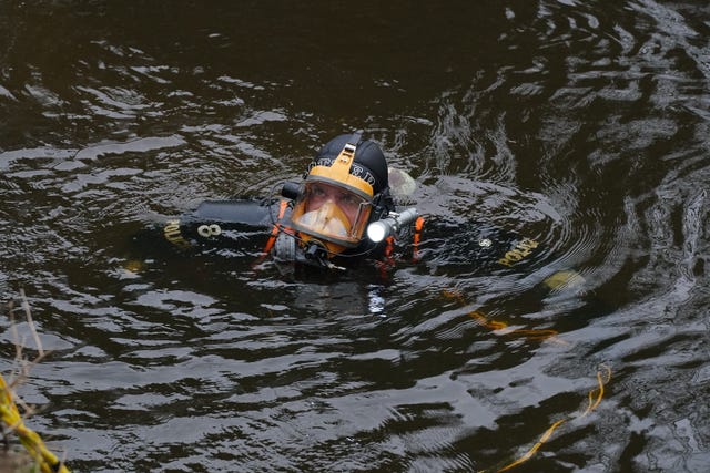 Diver searches river