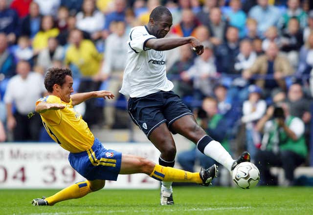 Michael Ricketts, right, won a solitary England cap after impressing for Bolton