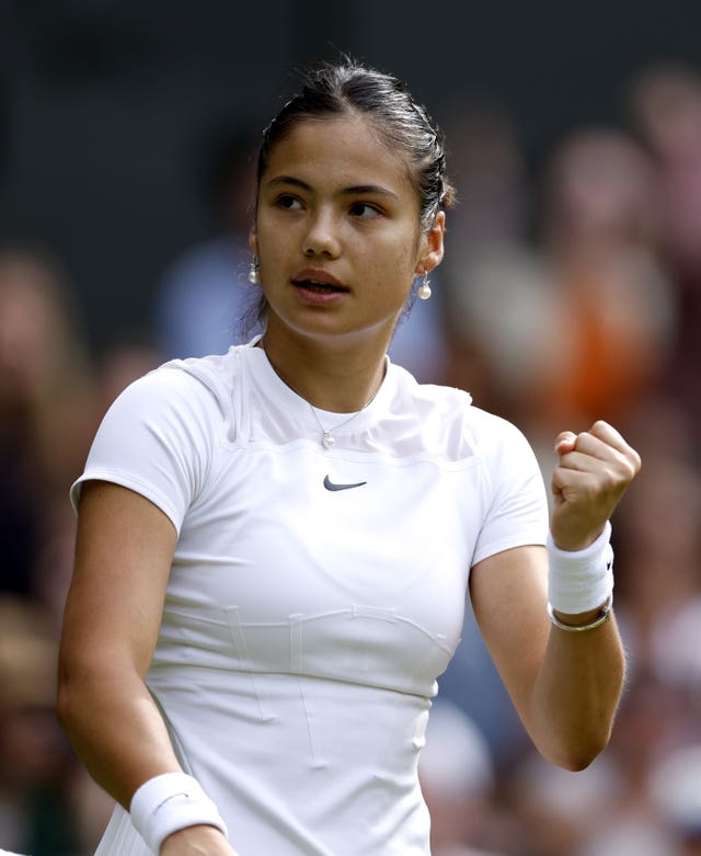 Emma Raducanu clenches her fist during a match at Wimbledon