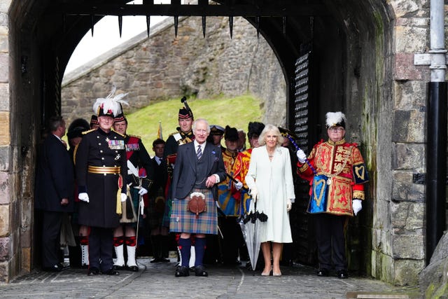 The governor of Edinburgh Castle Major General Alastair Bruce (left) and Lord Lyon (right) with the King and Queen (centre) as they attend a celebration at Edinburgh Castle to mark the 900th anniversary of the City of Edinburgh