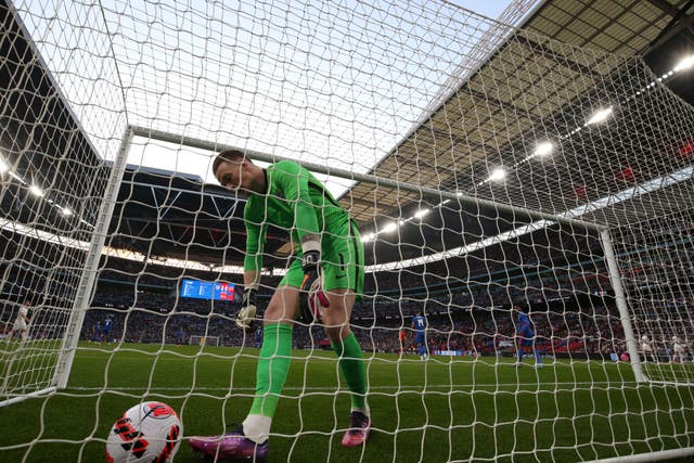 Jordan Pickford picks the ball out of the net