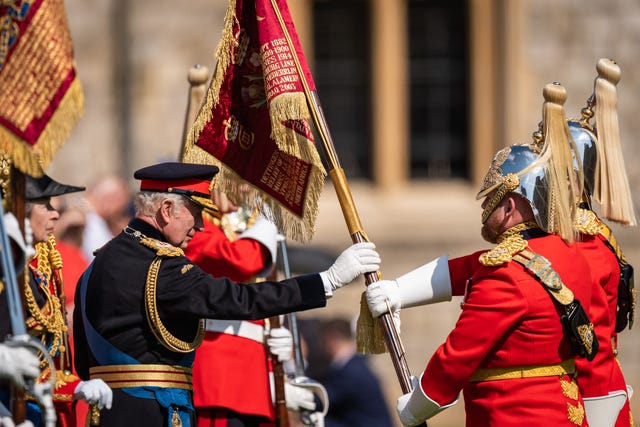 The King at the presentation of new standards to The Life Guards and the Blues and Royals