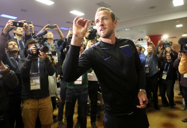 England captain Harry Kane played darts in front of the cameras during the team's World Cup campaign