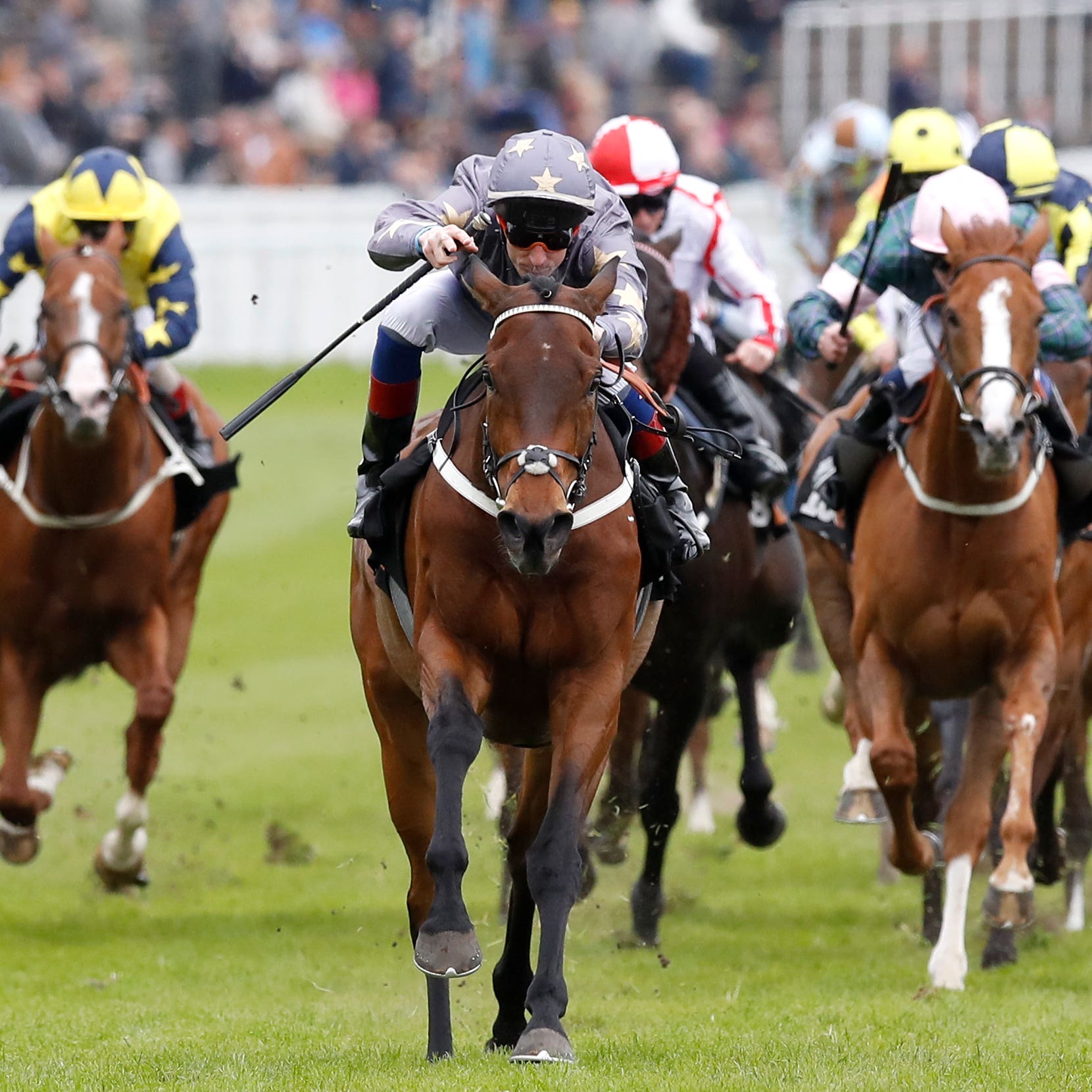Magic Circle (centre) winning the Chester Cup in 2018