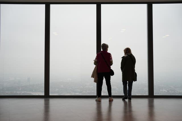 People look out from the viewing platform of Horizon 22 in Bishopsgate, London