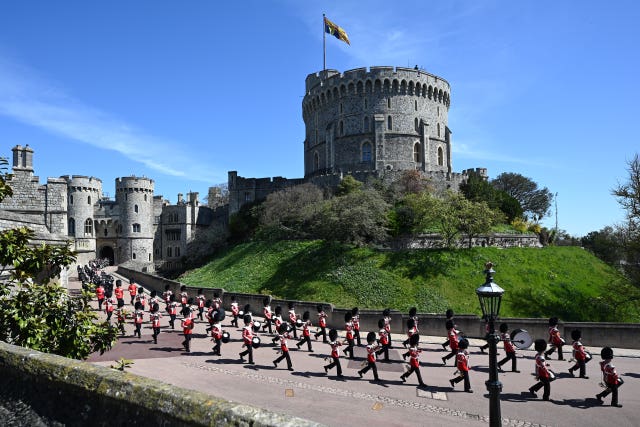 The Foot Guards Band  march into position ahead of the funeral 