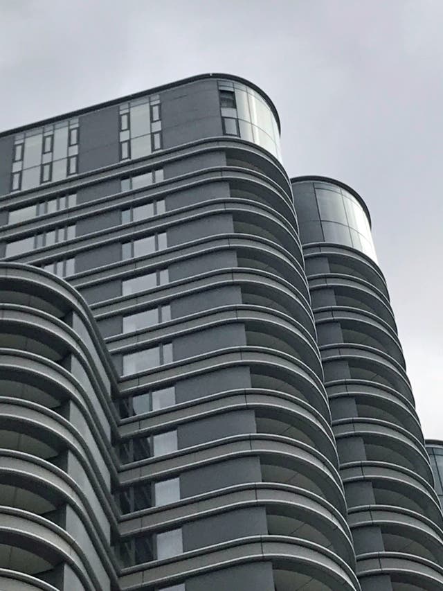 A missing window on the top floor of The Corniche, in central London, where a man has died after being hit by an object which fell from the building (Tess De La Mare/PA)