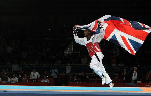 Lutalo Muhammad celebrates after winning bronze in London
