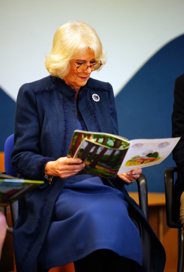The Queen Consort reading The Gruffalo to children during a visit to Rudolf Ross Grundschule School, Hamburg, to hear about the immersive language learning methods the school offers to its students