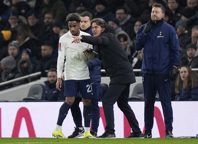 Tottenham boss Thomas Frank gives instructions to goalscorer Wilson Odobert 