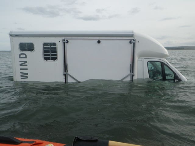 The horsebox partially submerged on Holy Island causeway 
