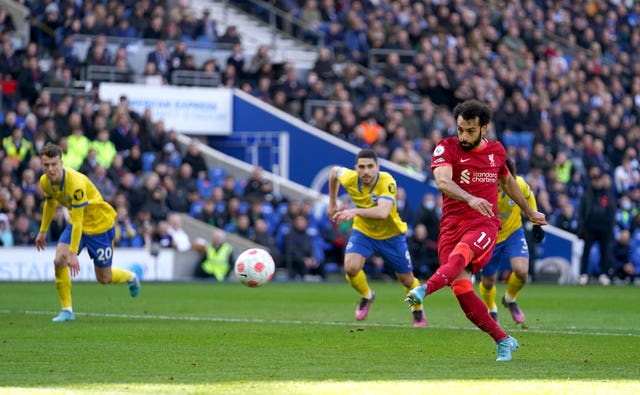 Liverpool maintain momentum with win at Brighton