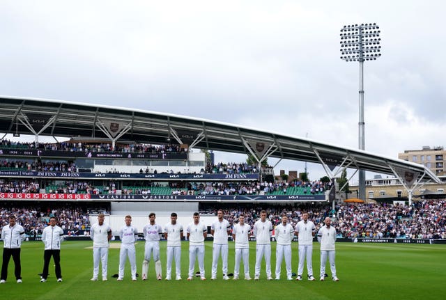 England players observe a minute's silence before play in the Test match against South Africa at the Kia Oval on Saturday
