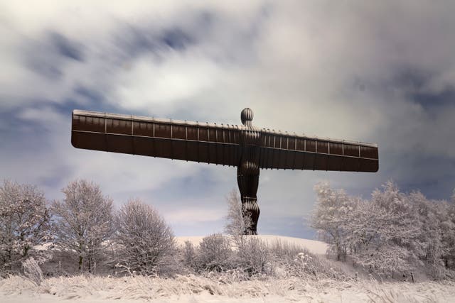 Snow surrounds Angel of the North