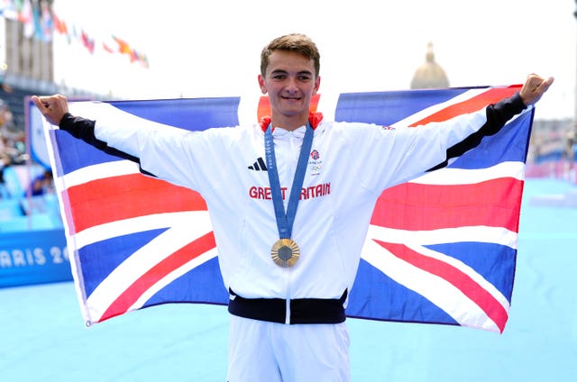 Alex Yee holding up a Union flag