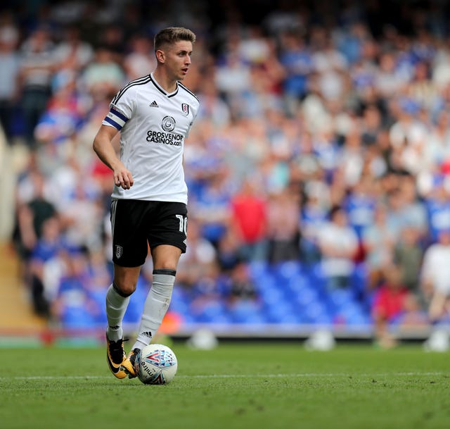 Fulham’s Tom Cairney controls the football