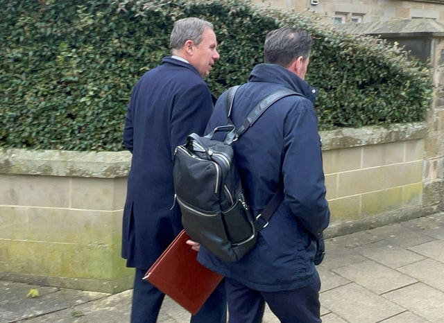 Defendant Chris Makin (left) leaves Harrogate Magistrates' Court 