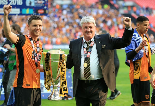 Hull manager Steve Bruce (right) and his son Alex Bruce celebrate after the Championship Play-Off final at Wembley