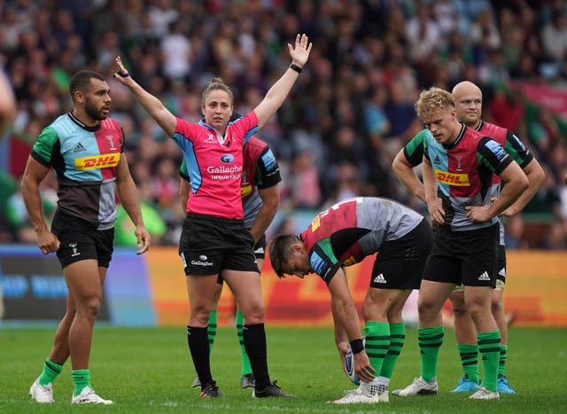 Sara Cox (centre) became the first woman to referee a Premiership rugby match when she took charge of Harlequins' clash with Worcester