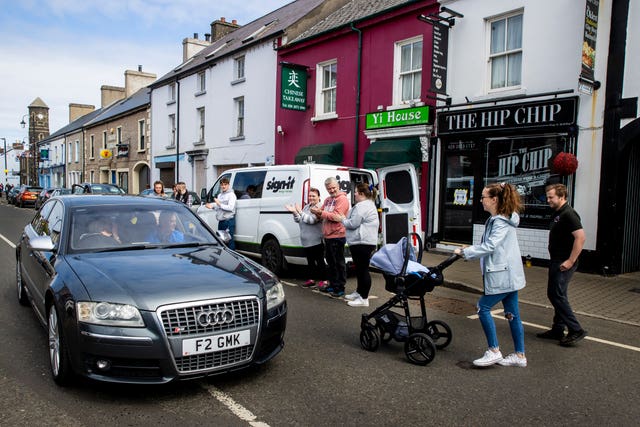 Geoffrey McKillop (in car)